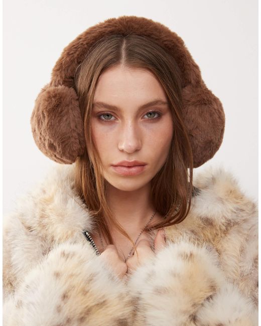 Cache-oreilles en fausse fourrure - foncé Collusion en coloris Brown