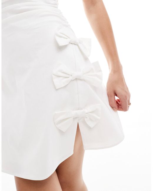 TFNC London Bridal Boat Neck A-Line Mini Dress With Bow Side in White | Lyst TFNC London Bridal Boat Neck A-Line Mini Dress With Bow Side in White | Lyst