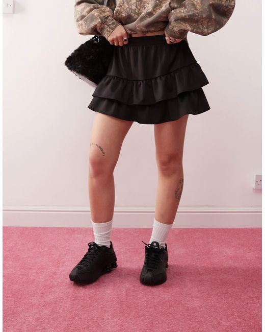 Collusion Pink – schwingender minirock mit asymmetrischem design