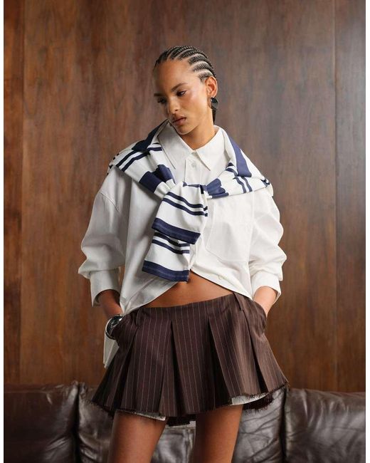Monki Brown Pleated Mini Skirt With Frayed Edge And Pocket Detail