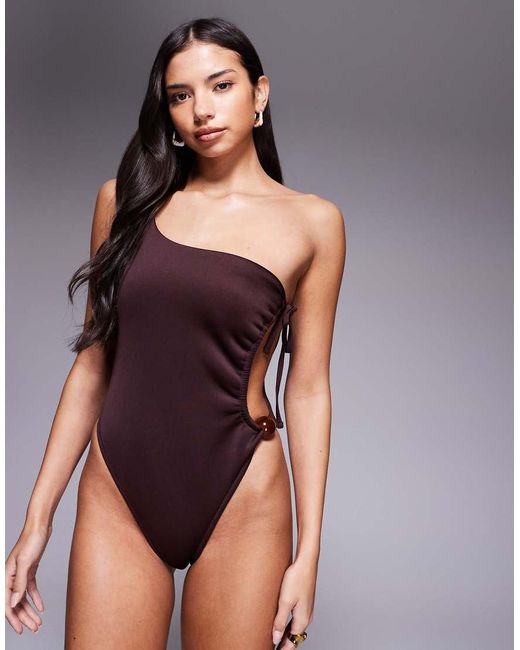 ASOS Purple Dora Premium One Shoulder Cut Out Swimsuit With Jumbo Bead