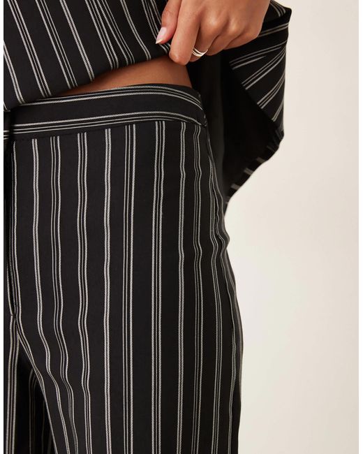 Pantalon d'ensemble évasé et ajusté à rayures - noir et blanc ASOS en coloris Natural