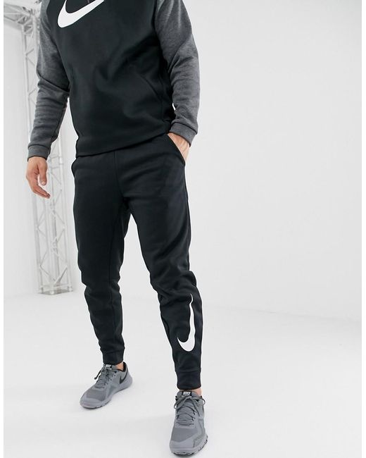 Nike Therma Fleece Tapered Pants in Black for Men | Lyst UK
