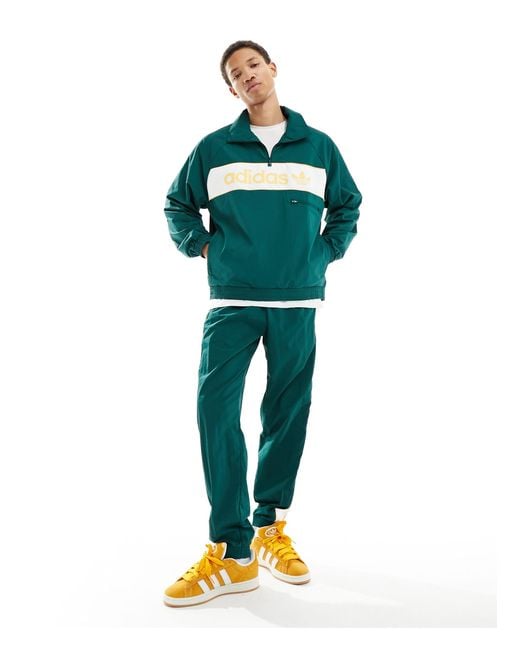 Coupe-vent avec logo linéaire - foncé et jaune Adidas Originals pour homme en coloris Green