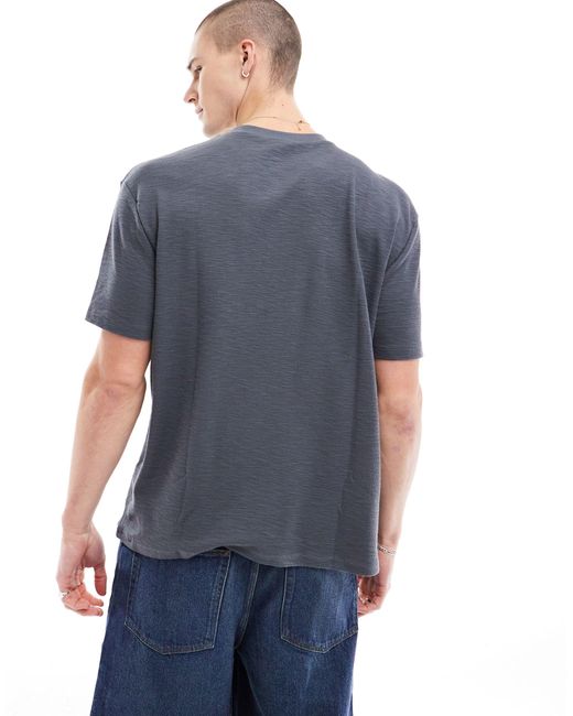 Camiseta gris carbón holgada con bolsillo ASOS de hombre de color Blue