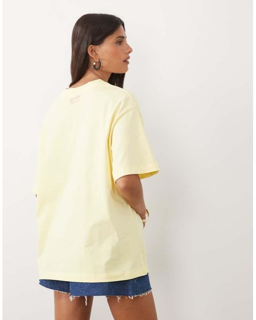 ASOS Yellow Disney Oversized T-Shirt With Minnie Surf Print