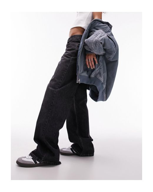 Ember - jeans a fondo ampio e vita bassa slavato di TOPSHOP in Blue