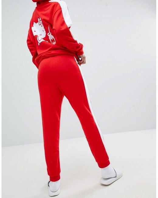 Hello kitty puma red top