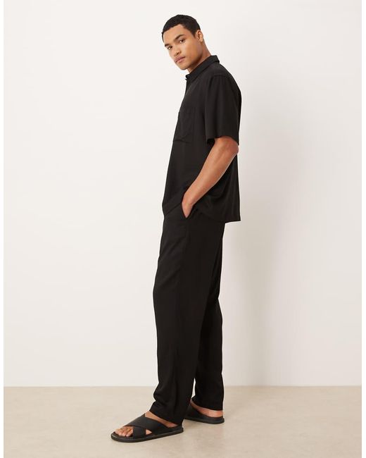 Pantaloni Affusolati Neri di ASOS in Black da Uomo