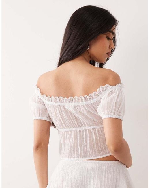 The Frolic White Exclusive Lace Trim Bardot Puff Sleeve Split Front Top Co-Ord
