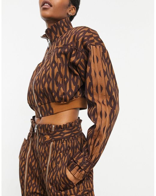 Ivy Park Adidas X Monogram Zip Detail Trousers in Brown | Lyst