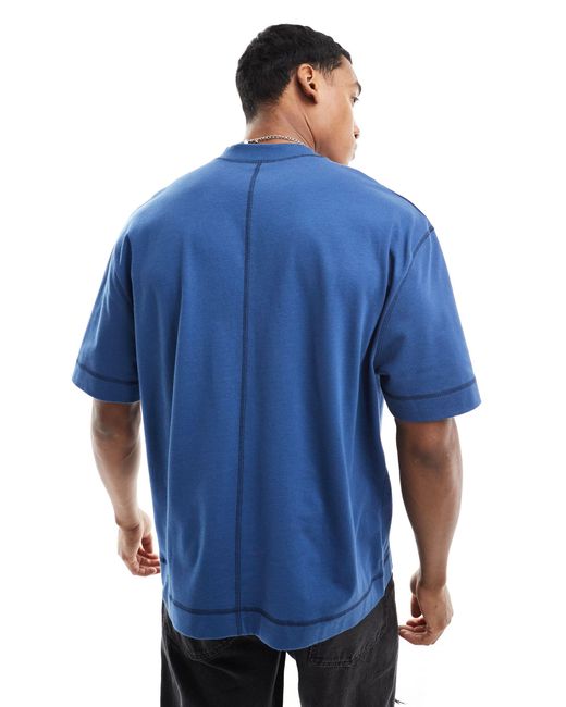 Camiseta azul marino extragrande con detalle ASOS de hombre de color Blue