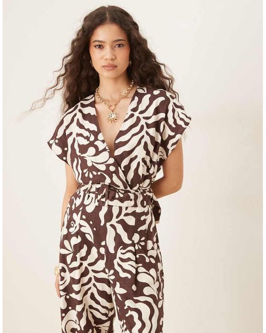 Mango Jumpsuit Met V-Hals, Riem En Bloemenprint in het Natural