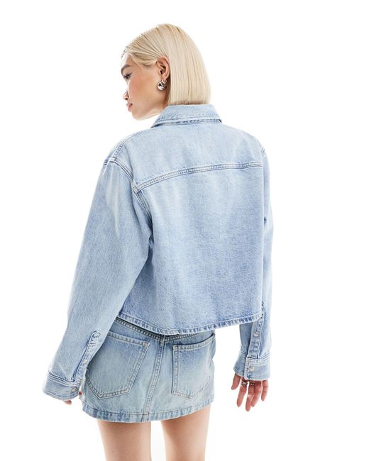 Surchemise en jean coupe carrée - clair délavé Calvin Klein en coloris Blue