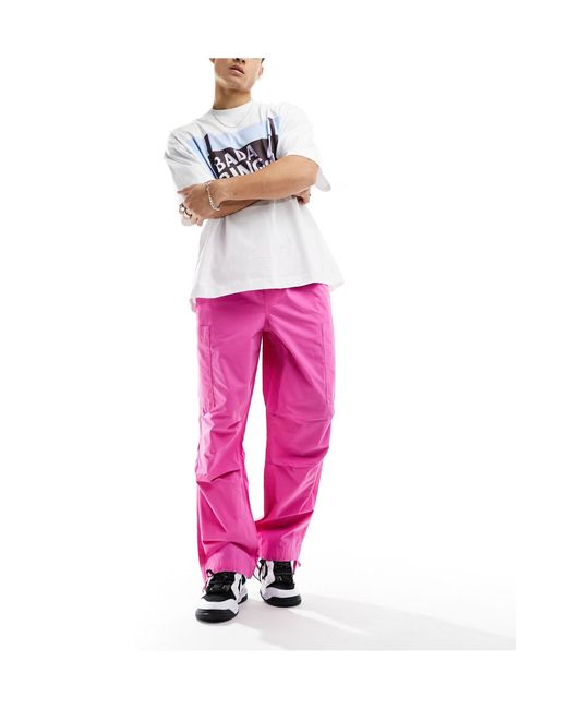 Pantalon cargo coupe large ASOS pour homme en coloris Pink