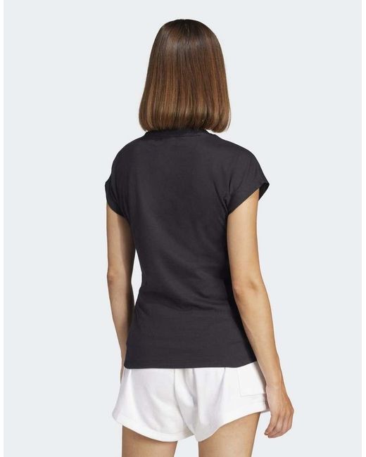 Camiseta Negra Y Blanca De Algodón Essentials Linear De -Negro Adidas Originals de color Blue