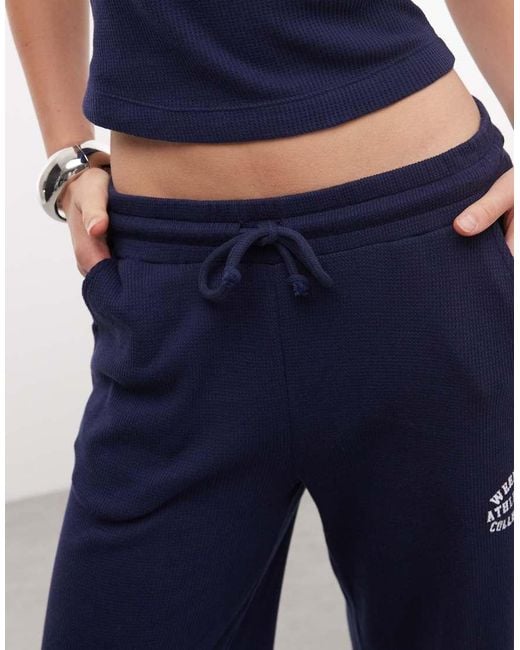 ASOS Blue Weekend Collective Waffle Wide Leg Sweatpants With Graphic