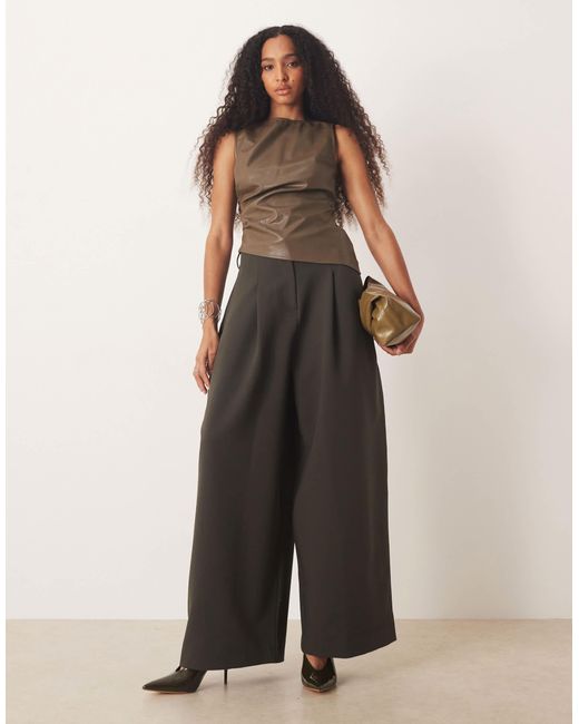 Pretty Lavish Green Leather Look Sleeveless Asymmetric Hem Top