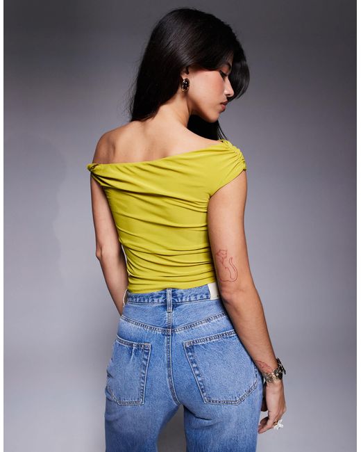 Top asymétrique avec bretelle torsadée - citron River Island en coloris Green