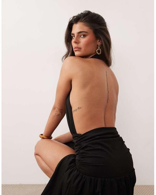 The Frolic Black Exclusive Plunge Halterneck Shirred Detail Low Back Thigh Split Maxi Dress