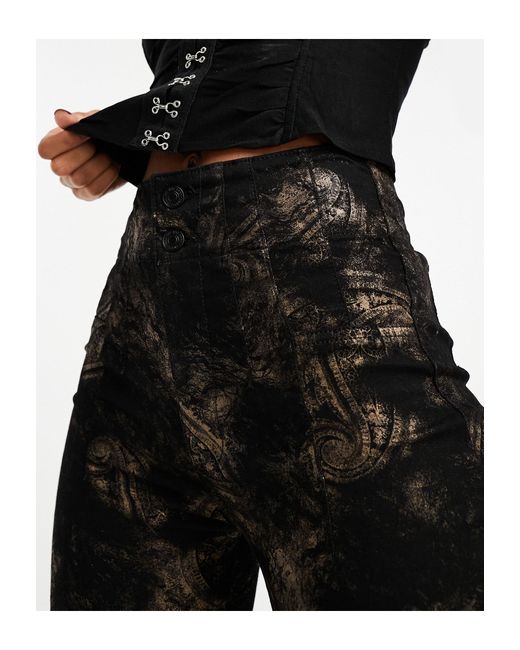 Jayde - jeans a zampa neri con dettagli metallici di Free People in Black
