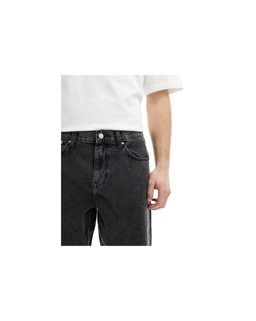 Jeans larghi nero slavato di ASOS in Black da Uomo