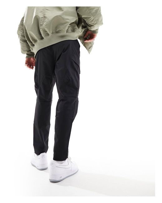 Nike Tech Essentials Cargo Pants in Black for Men Lyst