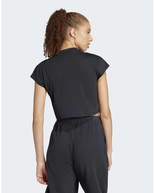 Camiseta Negra Con Diseño Encogido City Escape De Adidas Originals de color Black