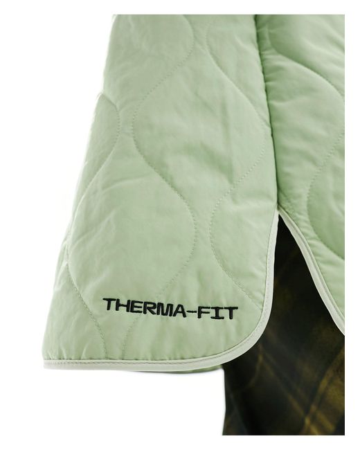 Sport utility - veste à matelassage losange - verre Nike en coloris Green