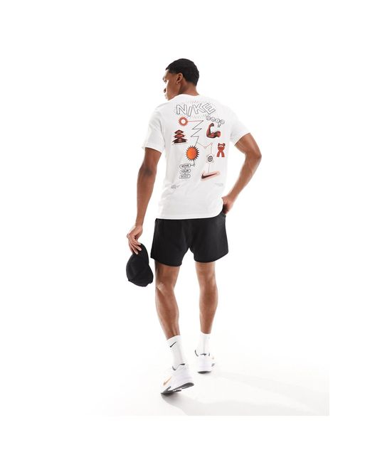 Camiseta blanca con estampado gráfico "work out" en la parte trasera Nike de hombre de color White
