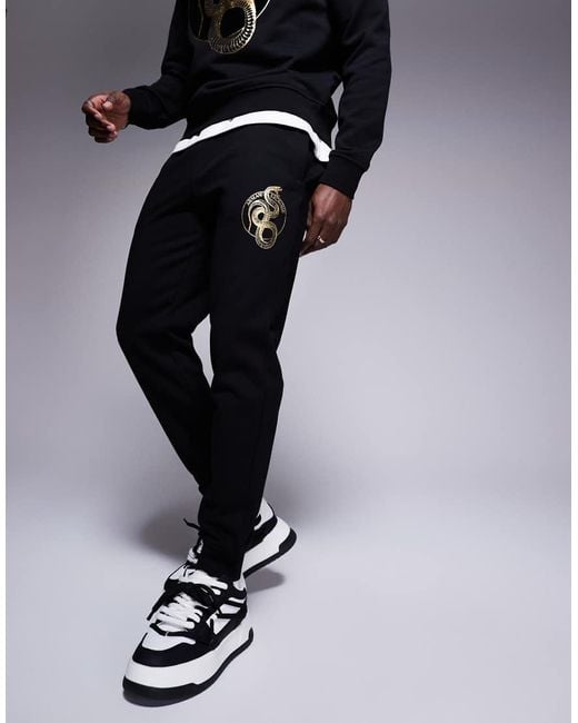 ARMANI EXCHANGE Black Lunar Capsule Snake joggers for men