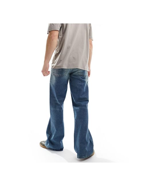 Jeans a zampa lavaggio chiaro di ASOS in Blue da Uomo