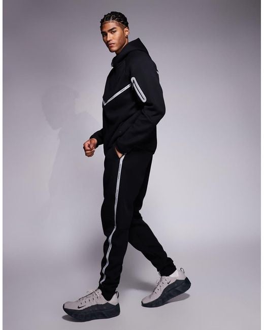 Nike Blue Tech Fleece Reflective Joggers for men