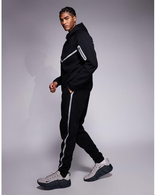 Nike Blue Tech Fleece Reflective Joggers for men