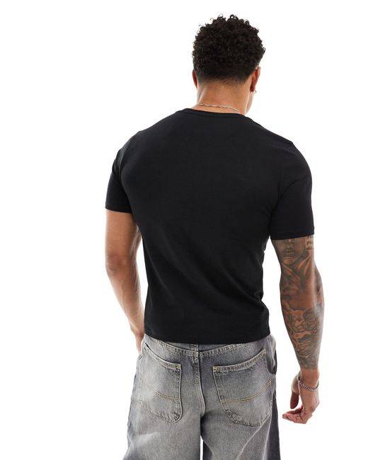 Camiseta negra ajustada con estampado ASOS de hombre de color Black