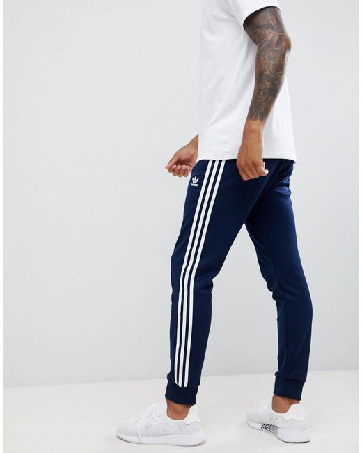 Adidas Originals Blue Three Stripe Skinny Sweatpants With Cuffed Hem for men