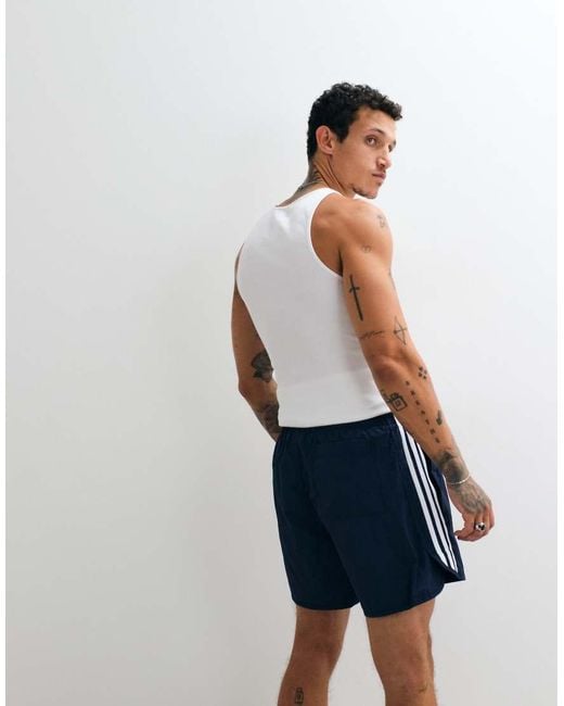 Adidas Originals Blue Adicolor Polyester 3 Stripe Shorter Shorts for men