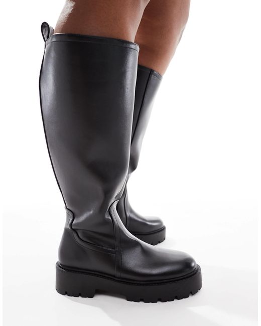Curve - carmen - bottes plates hauteur genou à semelle chunky ASOS en coloris Black