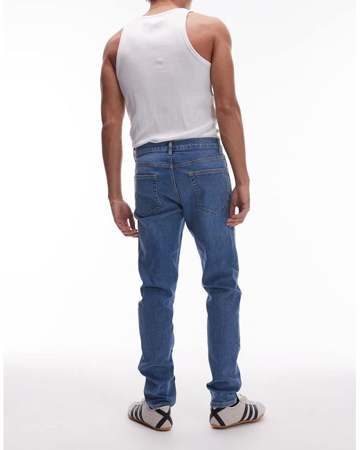 Vaqueros Elásticos De Corte Pitillo Con Lavado Azul Medio De Topman de hombre de color Blue