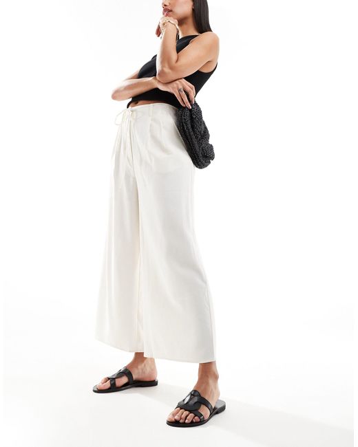 Pantalon droit en lin avec détail ceinture Mango en coloris White