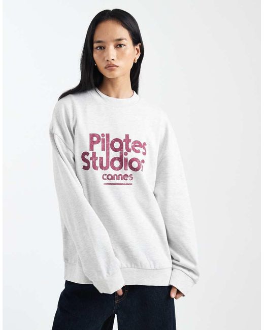 ASOS White Oversized Sweatshirt With Pilates Studio Graphic
