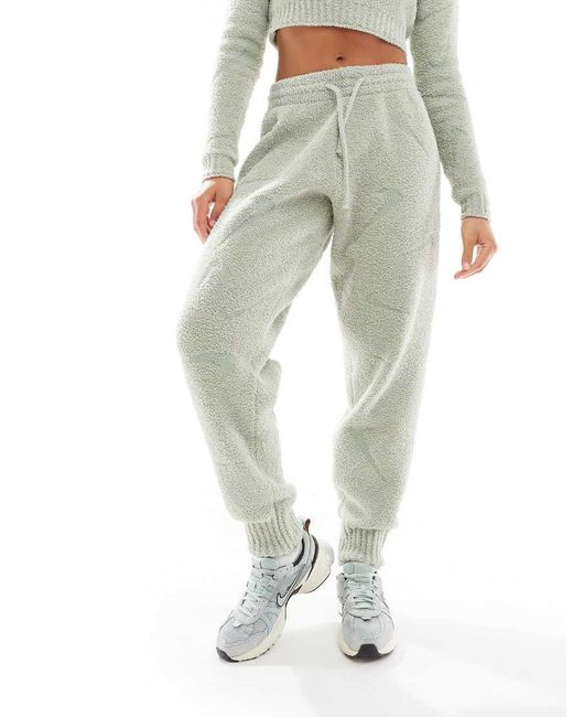 Nike Green Phoenix Boucle All Over Print Swoosh High-waisted joggers