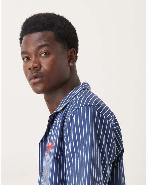 ASOS Ruimvallend Gestreept Overhemd Met Geborduurd Logo Op De Borst in het Blue voor heren
