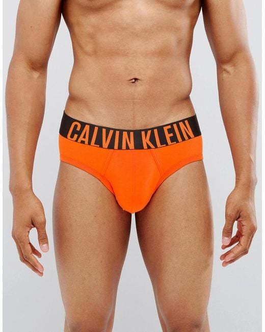 Calvin Klein Briefs Intense Power In Orange for Men | Lyst UK