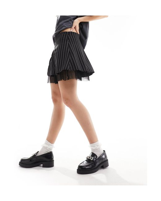 Minifalda con raya diplomática, volantes y lazos Reclaimed (vintage) de color Black