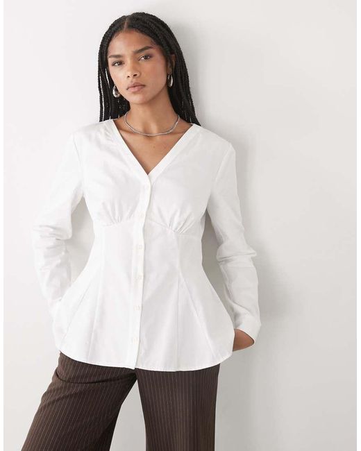 Reclaimed Vintage White Cinched -n Shirt With Seam Details And Peplum Hem