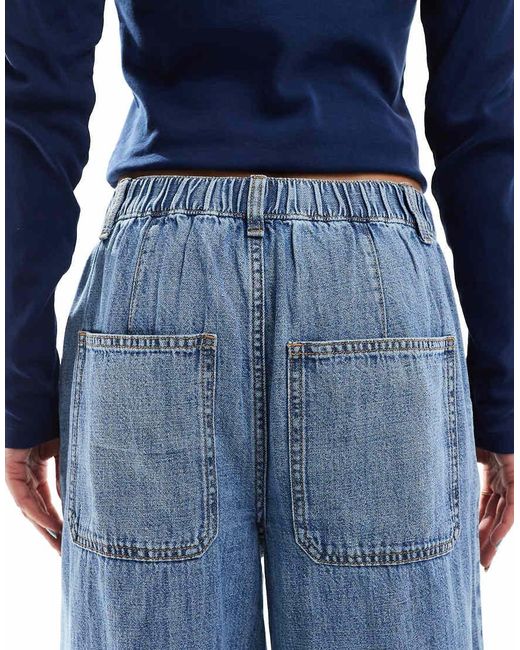 Jeans Morbidi A Fondo Ampio di ASOS in Blue