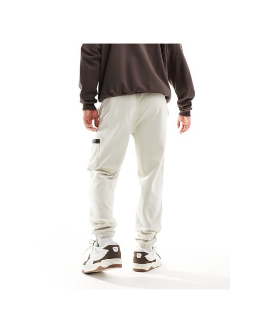 ASOS Natural Oversized joggers With Cargo Pocket And Woven Belt Detail for men