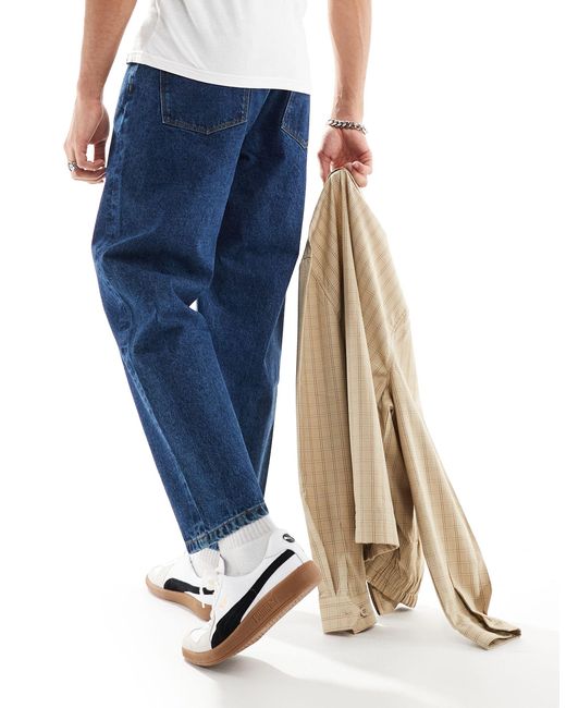 Jeans affusolati lavaggio medio di ASOS in Blue da Uomo