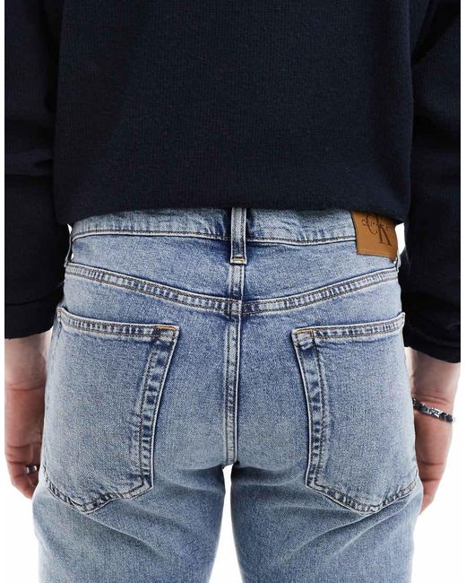 Calvin Klein Smaltoelopende Jeans Met Lichte Wassing in het Blue voor heren